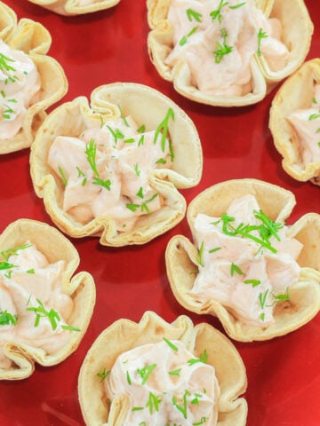 Smoked Salmon Appetizer Cups on a red placemat.