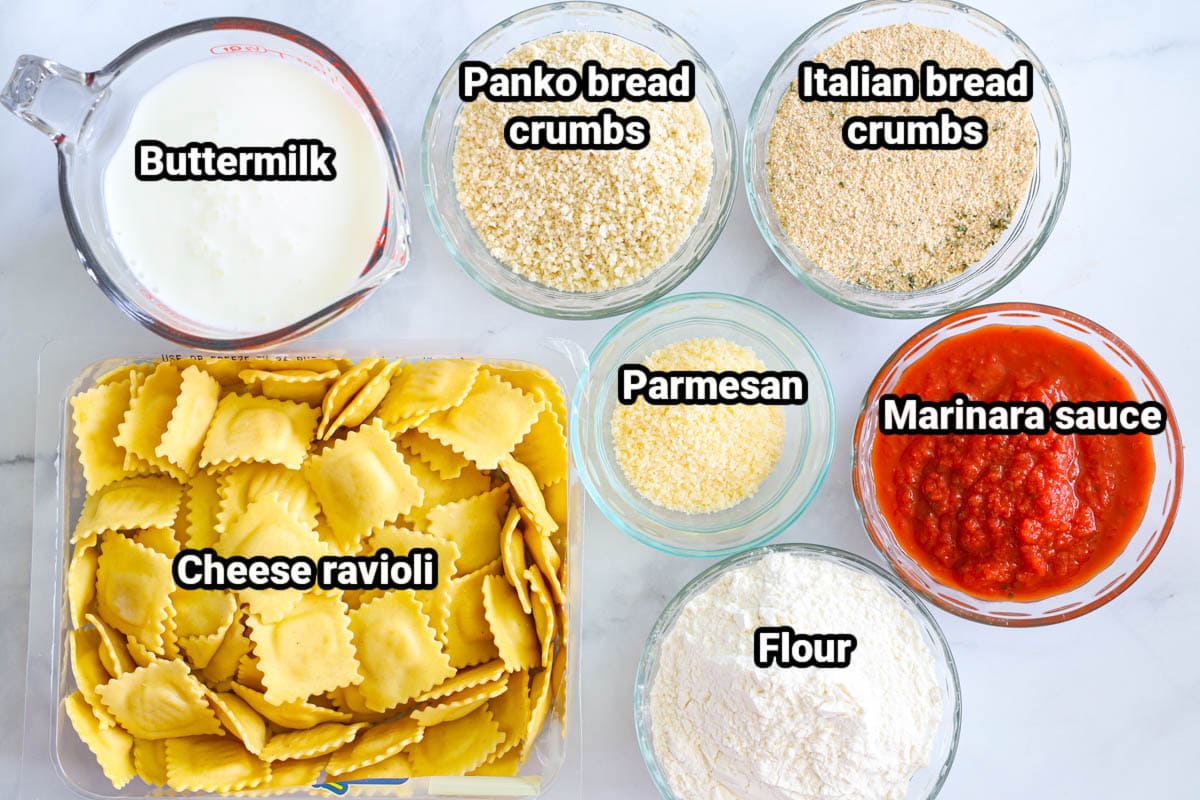 Ingredients for Crispy Fried Ravioli: cheese ravioli, buttermilk, Panko breadcrumbs, Italian breadcrumbs, marinara sauce, flour, and Parmesan cheese.