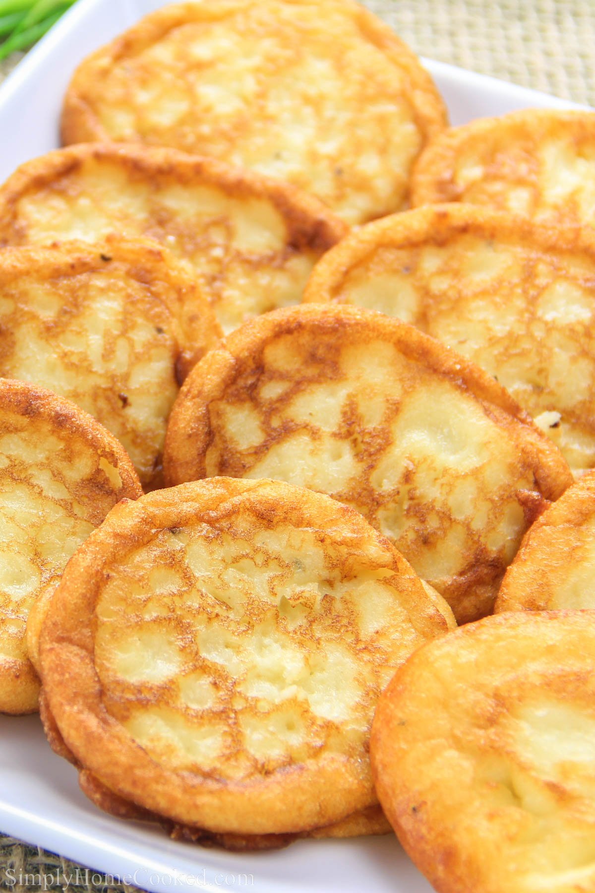 Savory Mashed Potato Pancakes on a white plate.