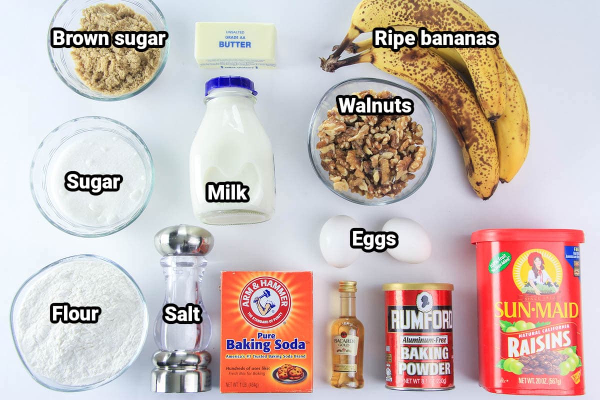 Ingredients for Banana Walnut Bread: brown sugar, sugar, flour, milk, butter, salt, baking soda, baking powder, rum, eggs, walnuts, ripe bananas, and raisins.