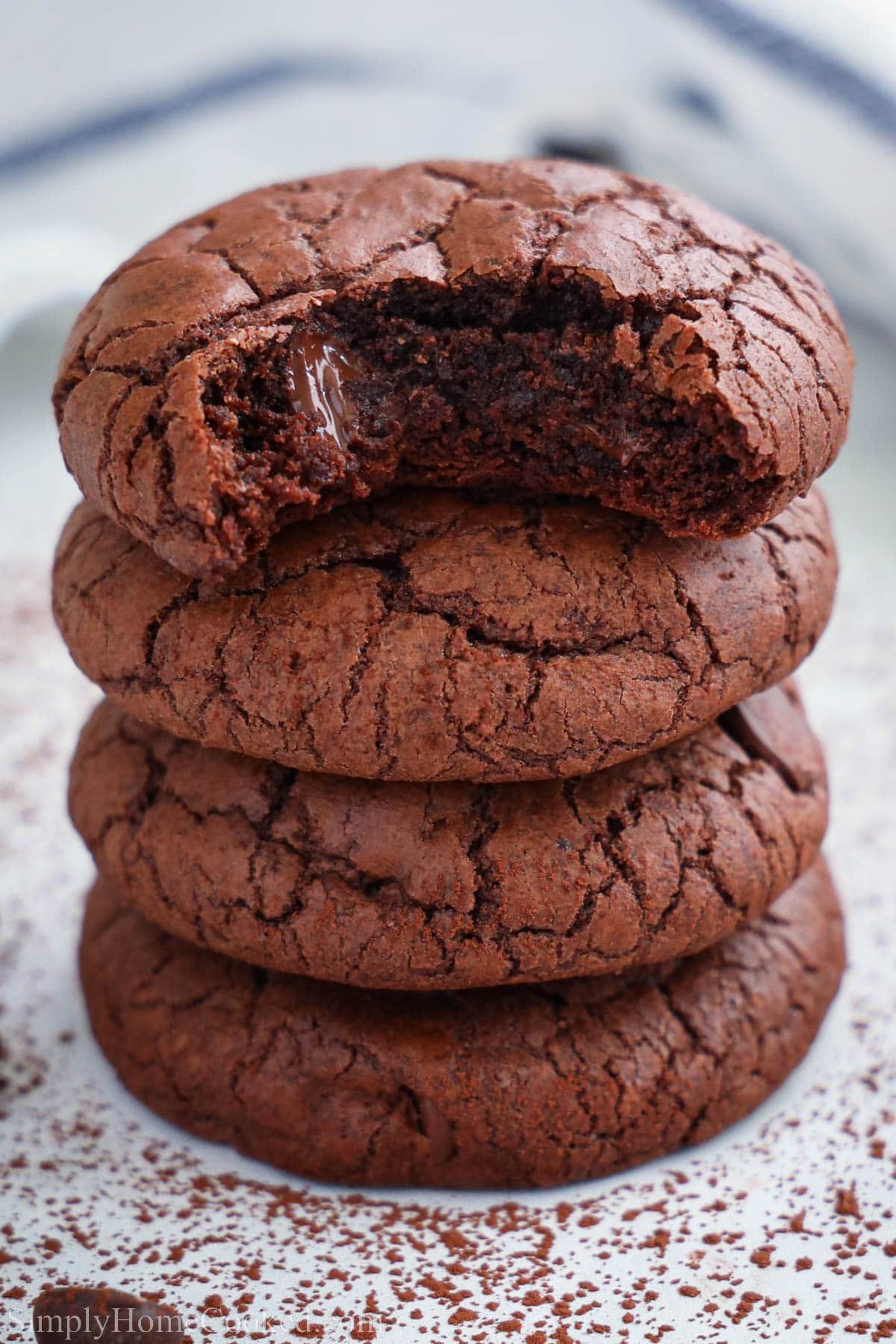 Stack of Brownie Cookies, the top one missing a bite.