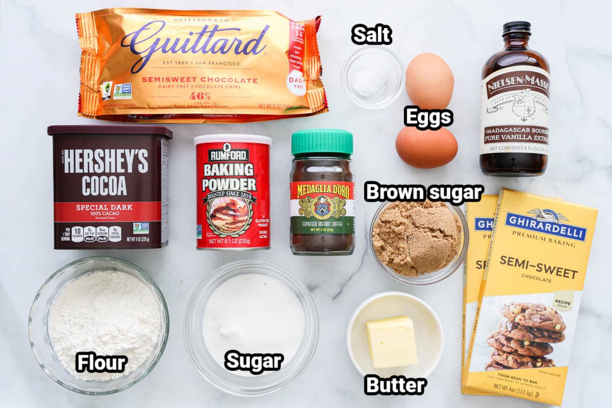 Ingredients for Brownie Cookies: semisweet chocolate chips, salt, eggs, vanilla extract, cocoa powder, baking powder, espresso powder, brown sugar, baking chocolate, flour, sugar, and butter.
