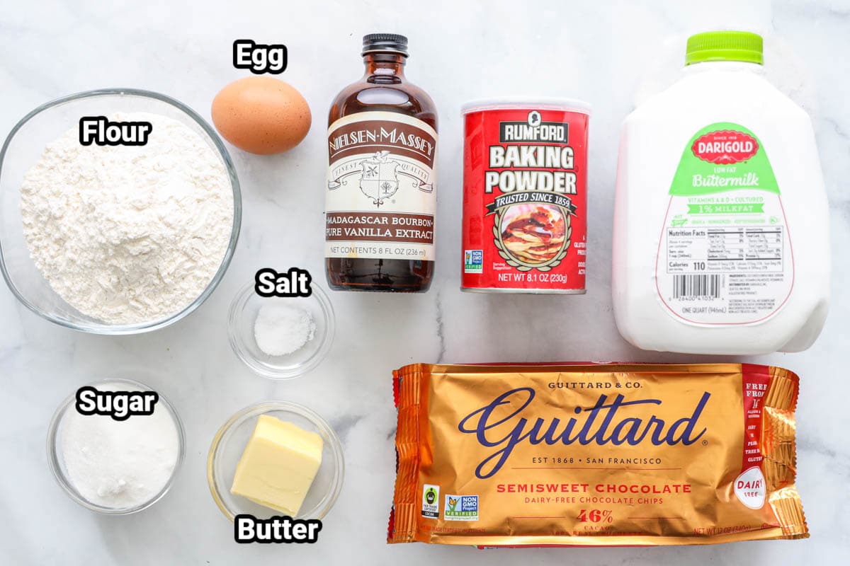 Ingredients for Chocolate Chip Pancakes: buttermilk, baking powder, flour, egg, vanilla, salt, butter, sugar, and chocolate chips.