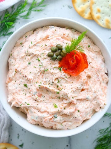 Smoked Salmon Dip, topped with smoked salmon, dill, and capers.