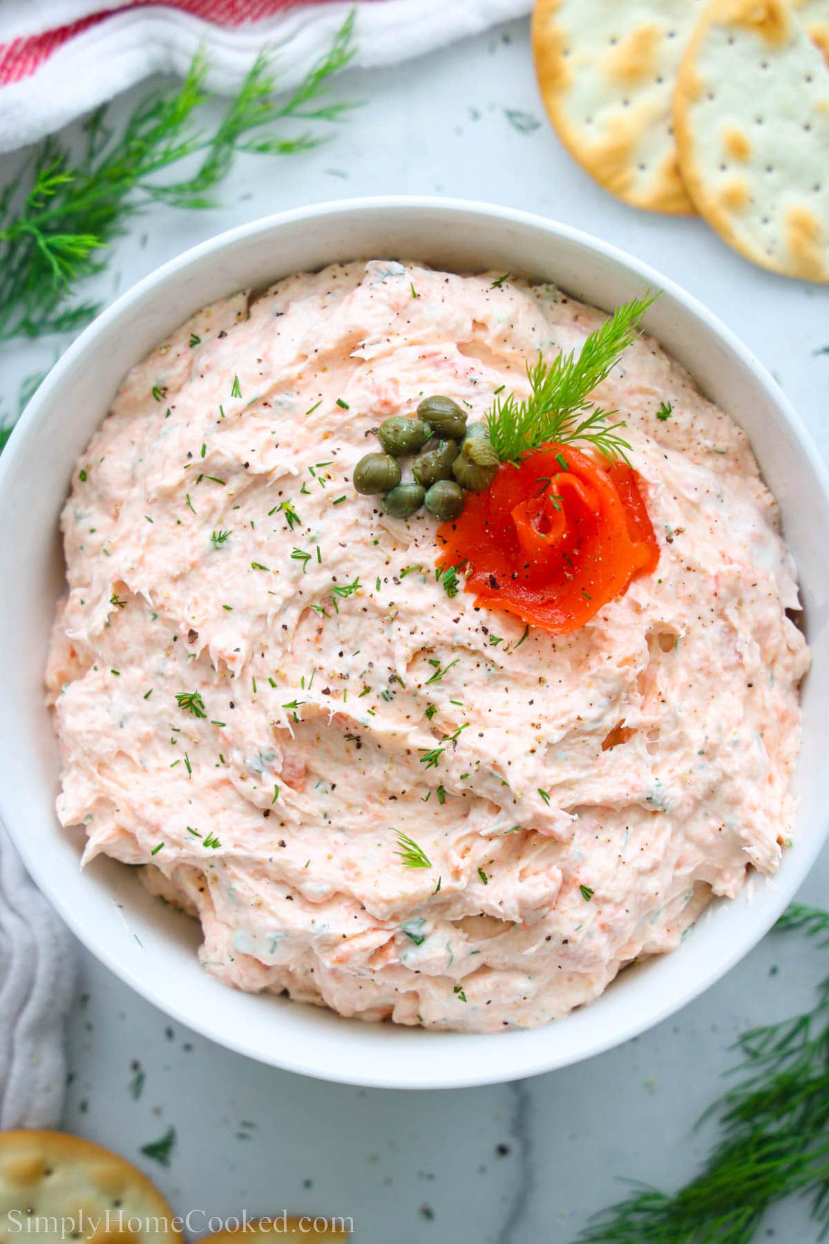 Smoked Salmon Dip, topped with smoked salmon, dill, and capers.