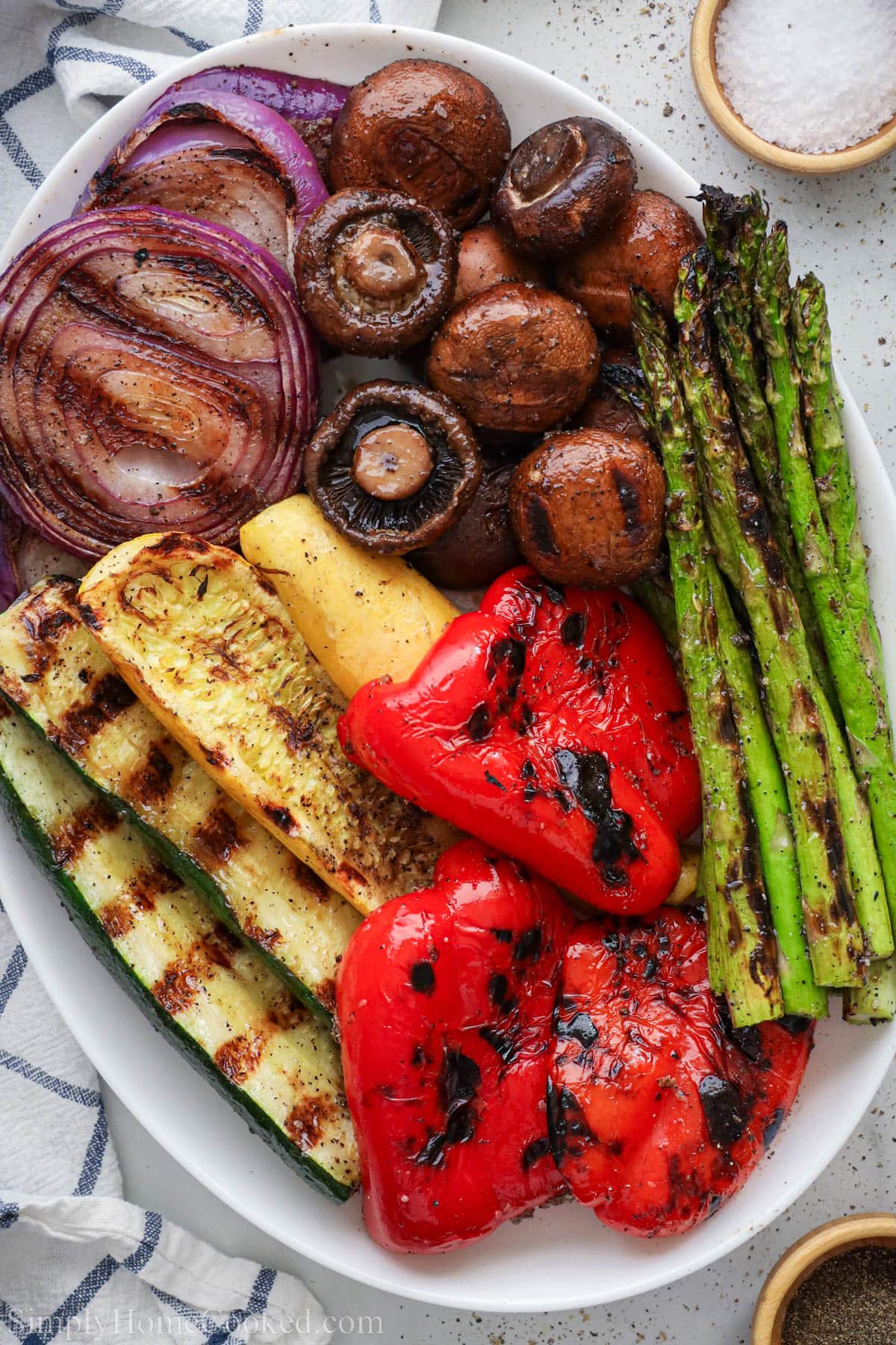 Grilled vegetables including zucchini, yellow squash, mushrooms, asparagus, red pepper, and red onion.