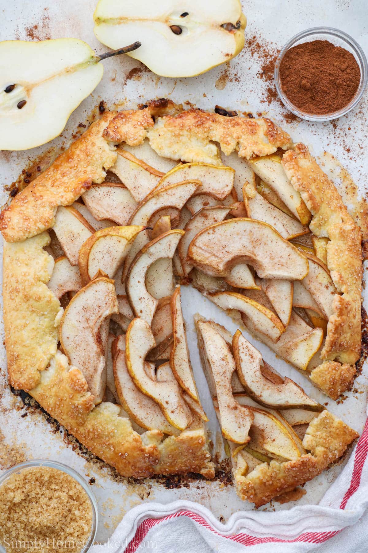 Overhead of a Pear Galette with a slice cut out.