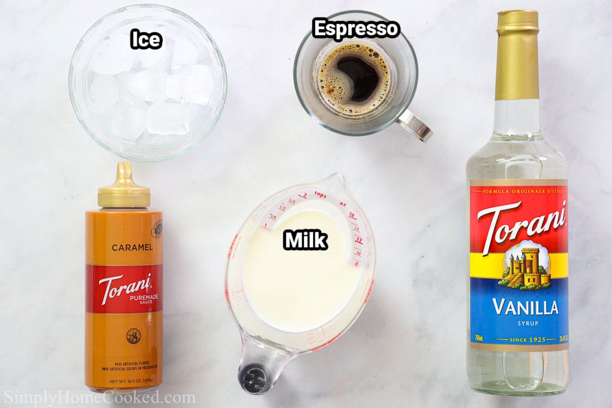 Ingredients for Iced Caramel Macchiato: caramel sauce, milk, vanilla syrup, espresso, and ice.