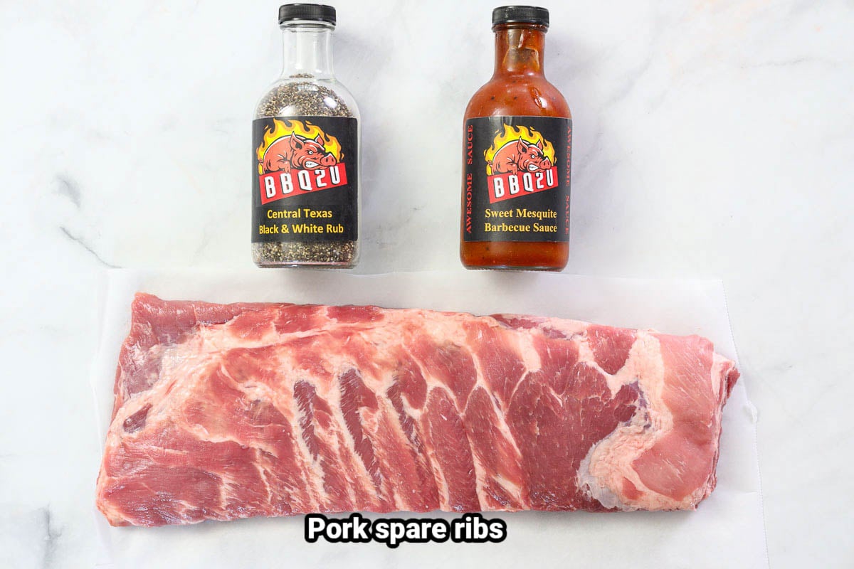 Ingredients for Smoked Ribs: spare ribs, rub, and barbecue sauce.
