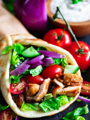 Chicken Shawarma in a pita with vegetables.