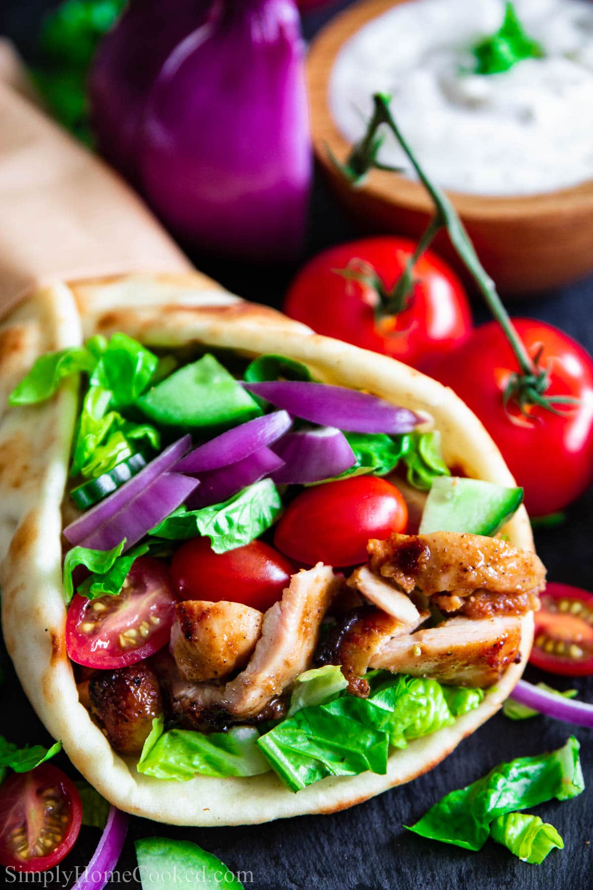 Chicken Shawarma in a pita with vegetables. 