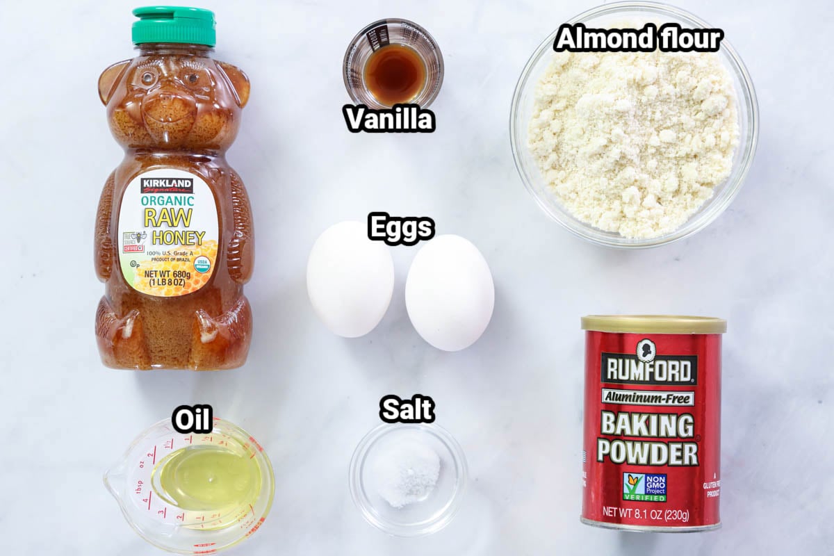 Ingredients for Almond Flour Pancakes: almon flour, vanilla, honey, eggs, salt, oil, and baking powder. 
