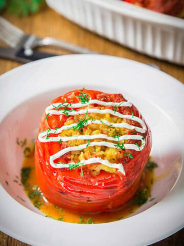 Chicken and Rice Stuffed Pepper with Sour cream on top.