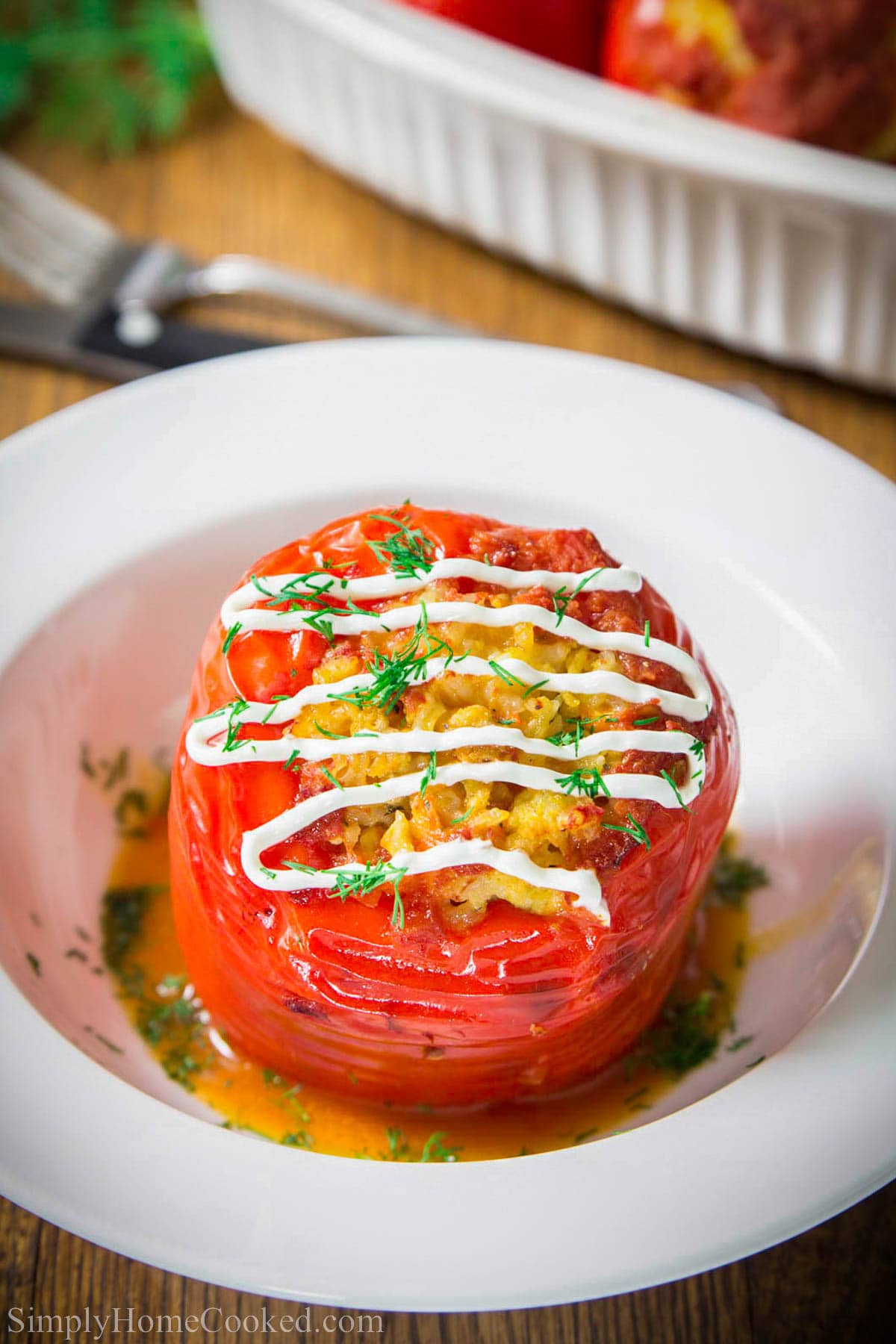 Chicken and Rice Stuffed Pepper with Sour cream on top. 