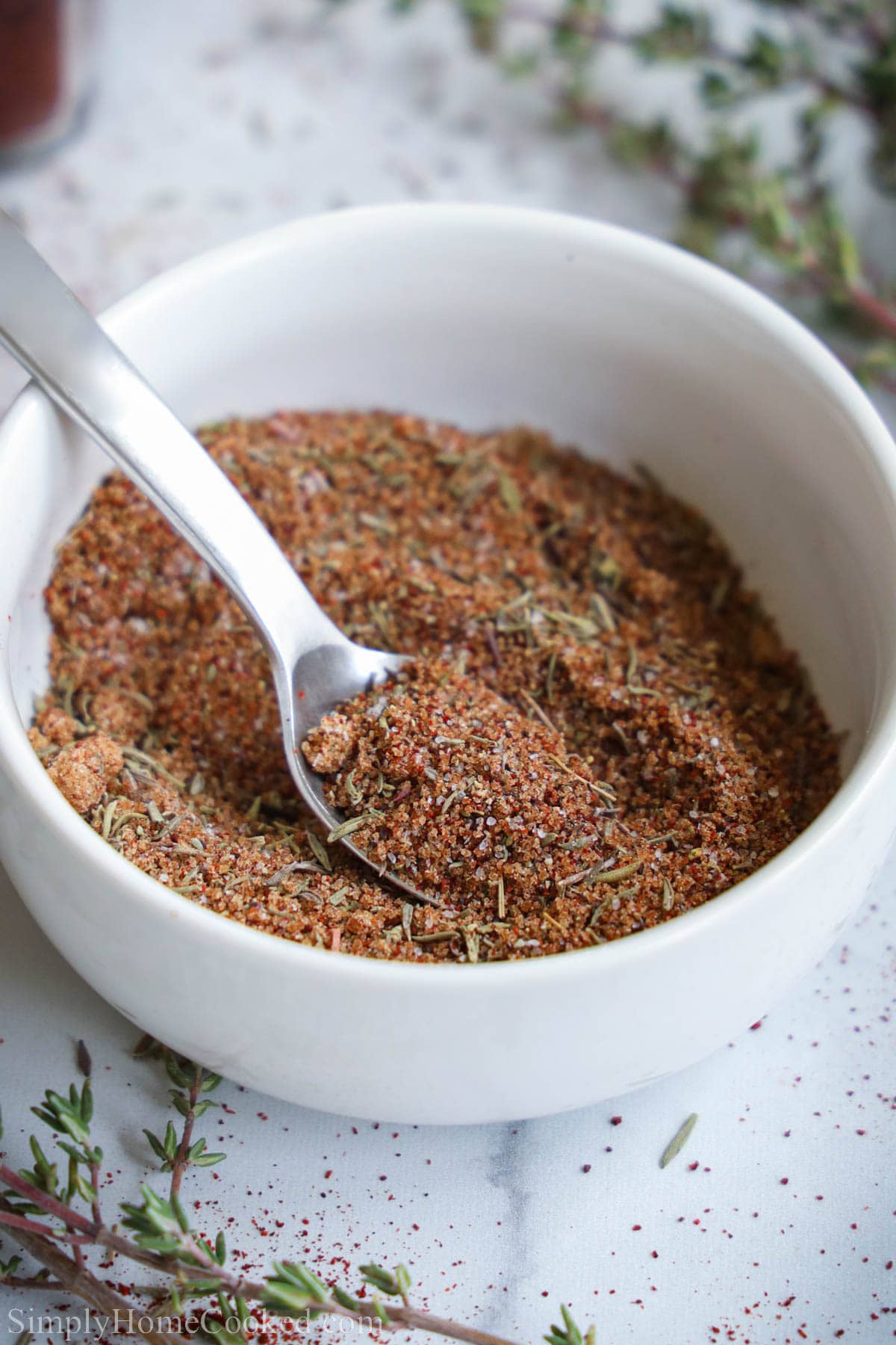 Salmon Seasoning in a bowl with a spoon. 