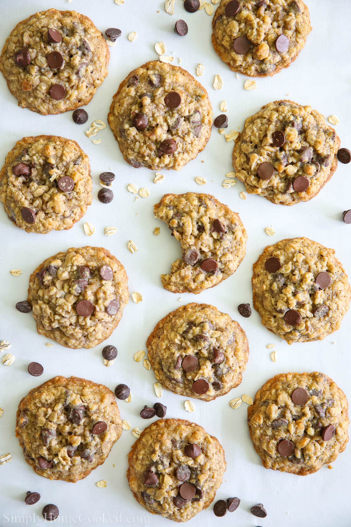 Overview of Oatmeal Chocolate Chip Cookies on a baking sheet.