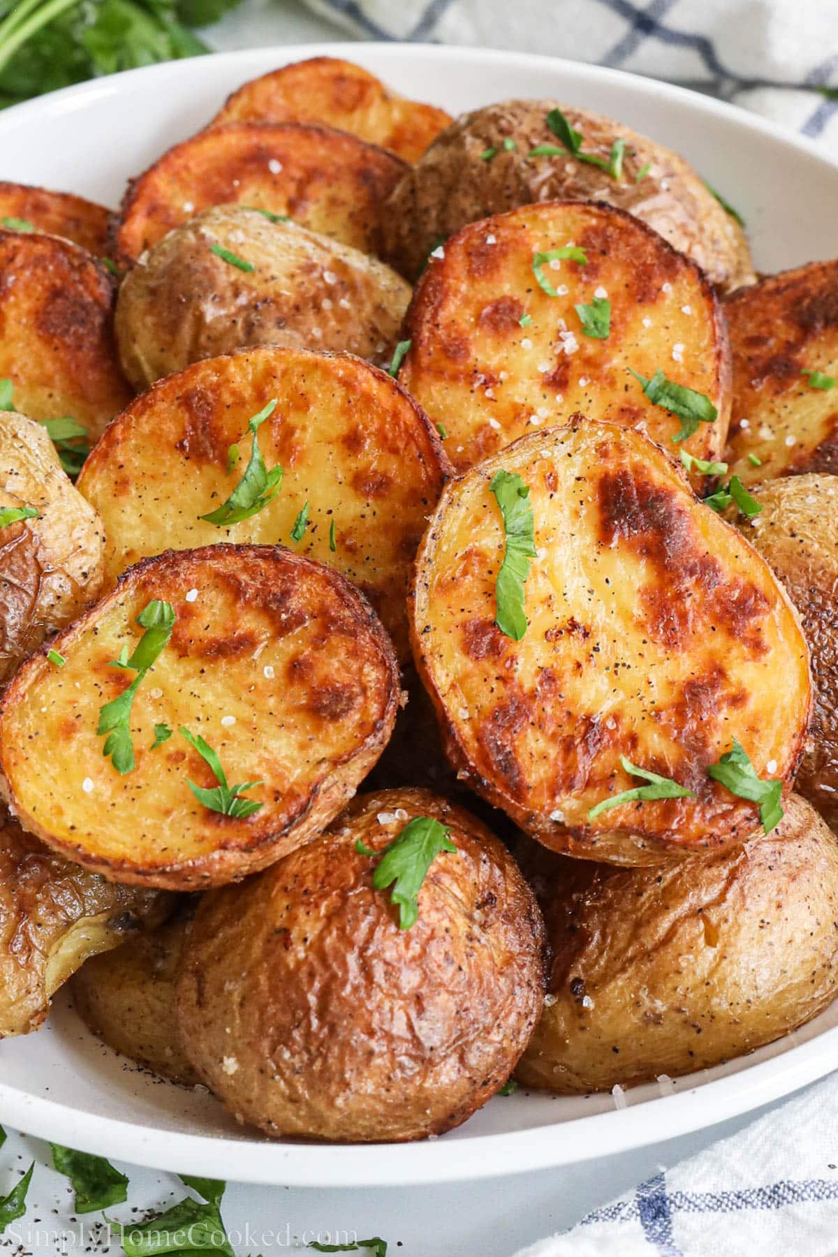 Roasted Yukon Gold Potatoes toped with parsley. 