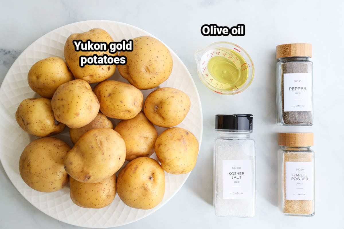 Ingredients for Roasted Yukon Gold Potatoes: Yukon gold potatoes, olive oil, kosher salt, garlic powder, and black pepper. 