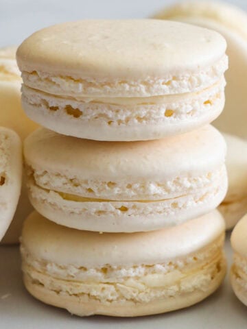 Vanilla Macarons stacked.