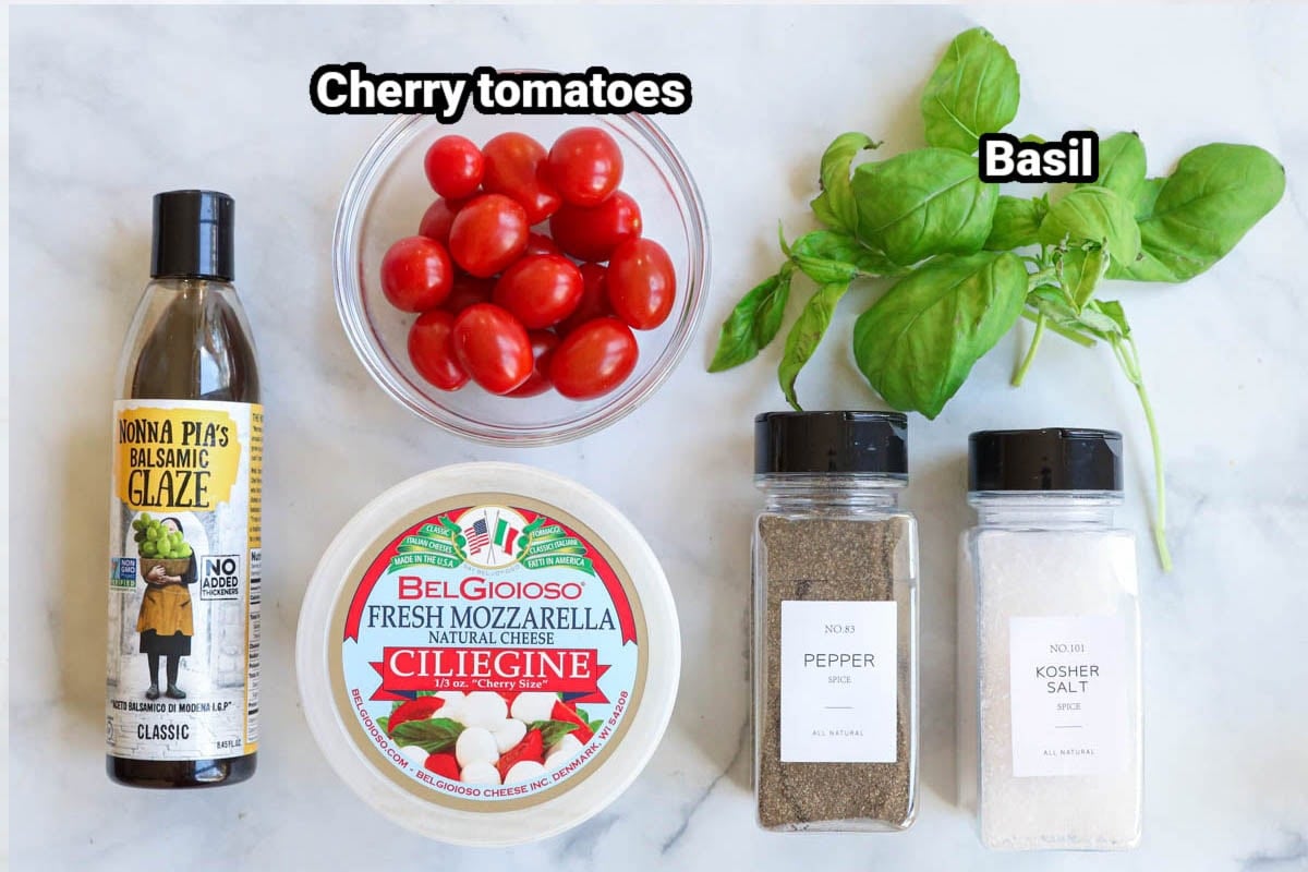 Caprese Skewers Ingredients: cherry tomato, fresh mozzarella cheese, basil, balsamic glaze, kosher salt, black pepper.