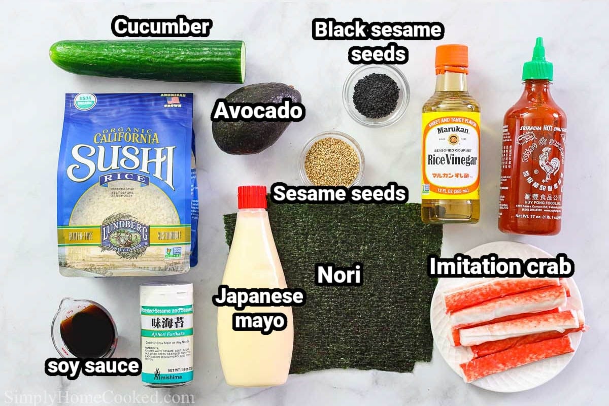 Ingredients for California Roll Sushi Bowls: imitation crab, Sriracha, rice vinegar, black sesame seeds, avocado, sesame seeds, nori sheets, Japanese mayo, furikake, soy sauce, sushi rice, and cucumber. 