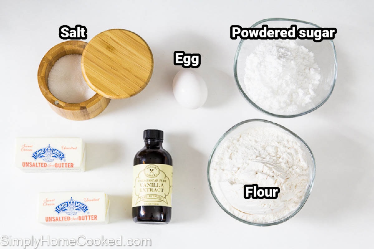 Ingredients for a Bakewell Tart crust: powdered sugar, egg, salt, flour, butter, and vanilla. 