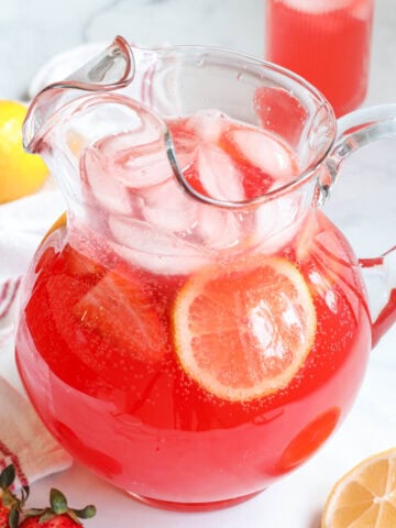 Sparkling Fruit Punch in a pitcher with ice.