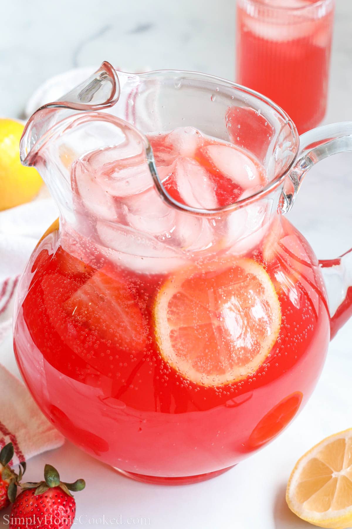 Sparkling Fruit Punch in a pitcher with ice.