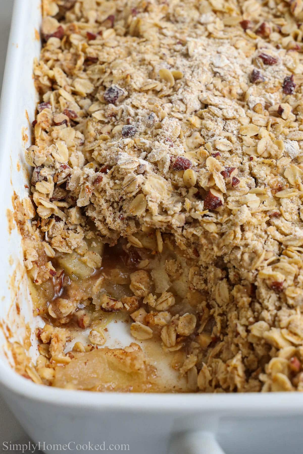 Close up of Apple Crisp missing a piece. 
