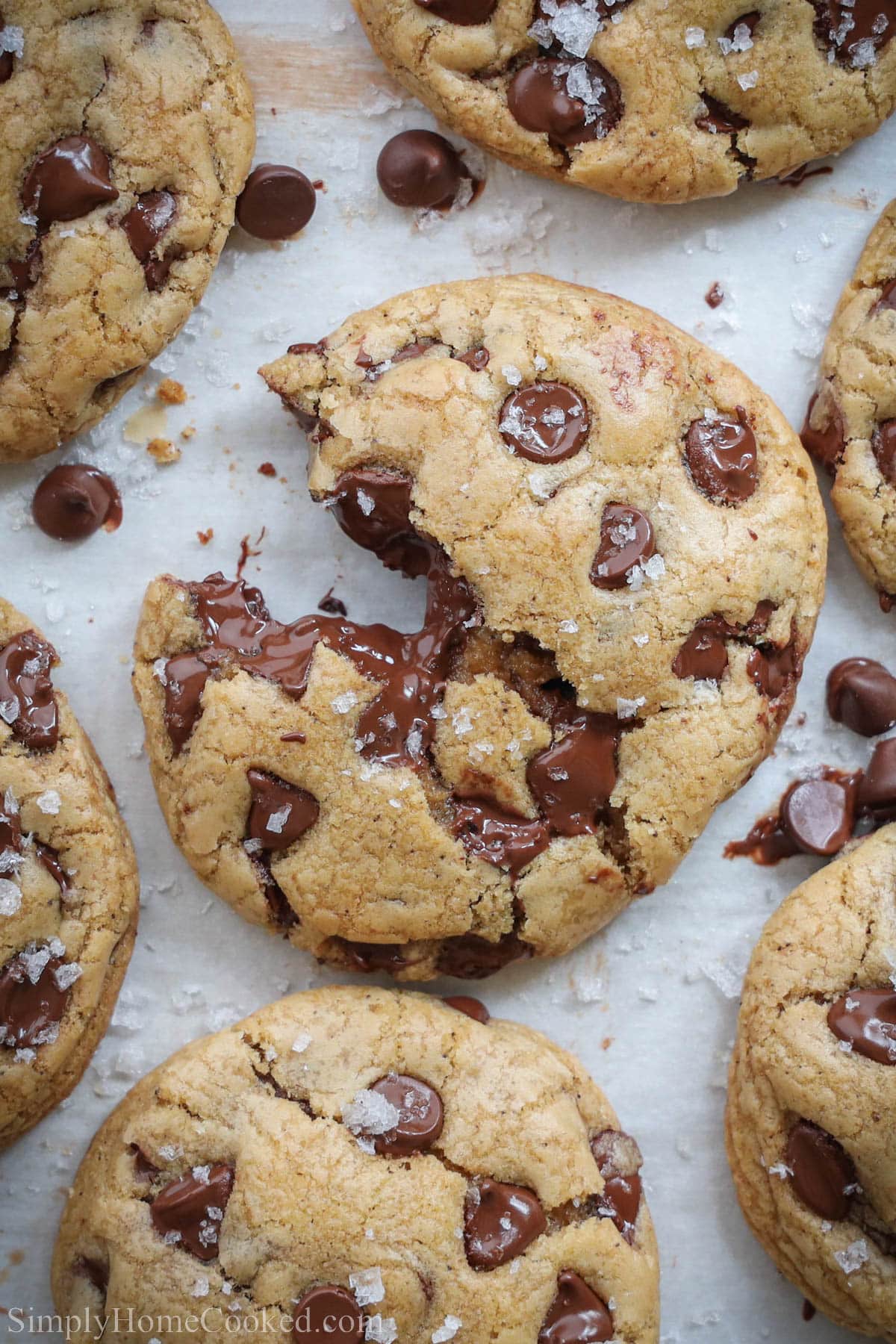 Brown Butter Chocolate Chip Cookies, one split open. 