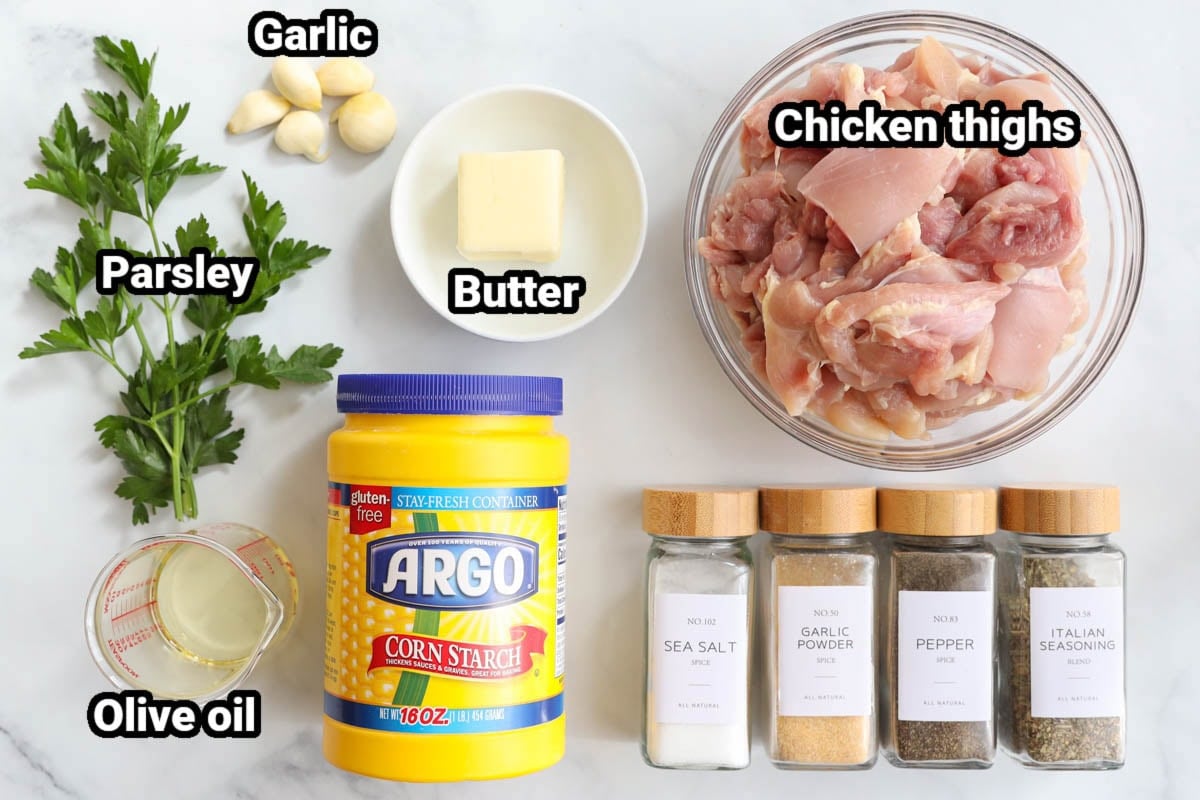 Ingredients for Garlic Butter Chicken Bites: Chicken thighs, butter, garlic cloves, parsley, olive oil, corn starch, seas salt, black pepper, garlic powder, and Italian seasoning.
