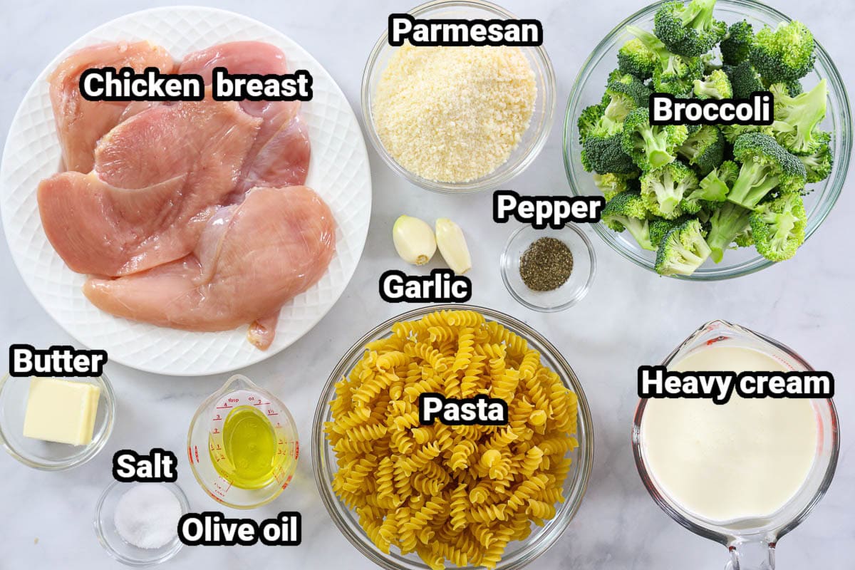 Ingredients for Chicken Broccoli Alfredo: chicken breast, parmesan cheese, broccoli, butter, salt, olive oil, garlic, pepper, rotini pasta, and heavy cream.