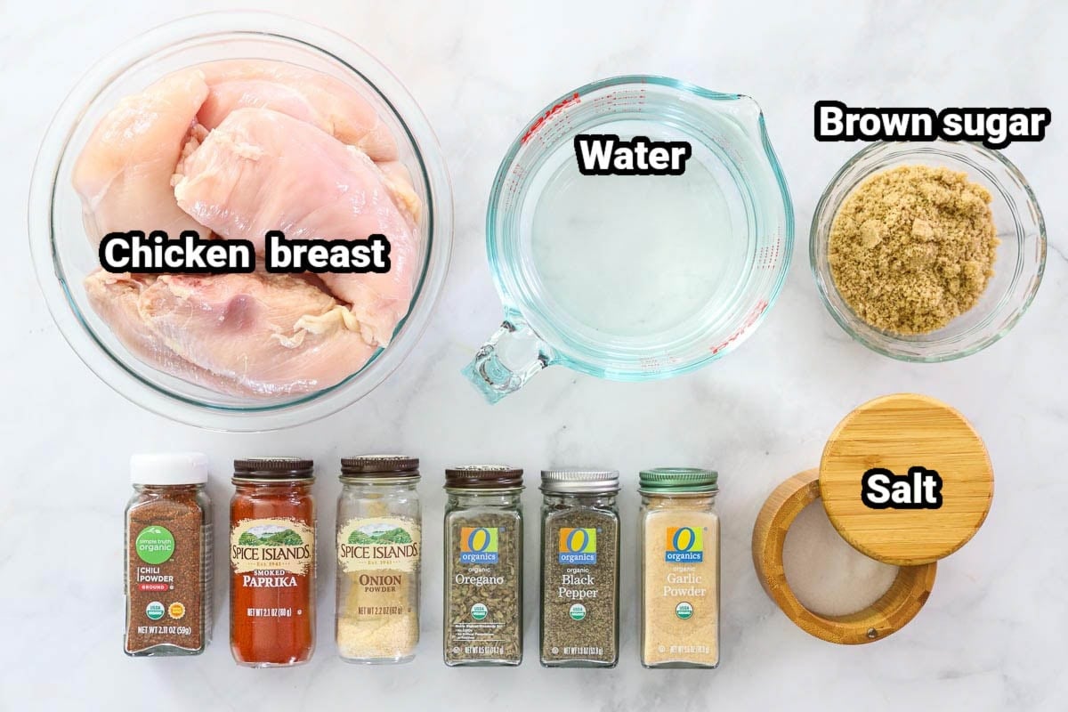 Ingredients for Smoked Chicken Breast: chicken breasts, water, brown sugar, salt, chili powder, paprika, onion powder, garlic powder, oregano, salt, black pepper, and garlic powder.
