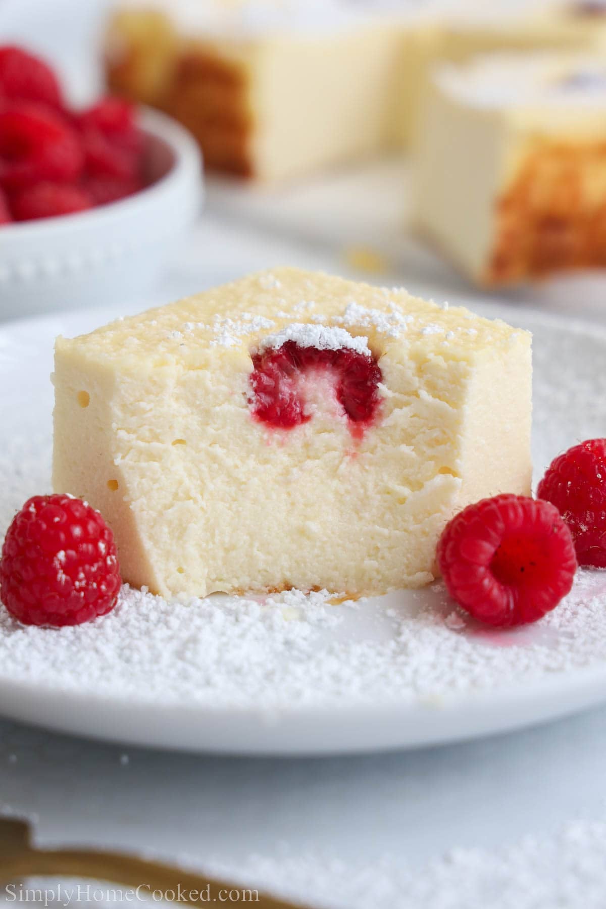 Close up of Zapekanka (Farmer's Cheese Cake) missing a bite.
