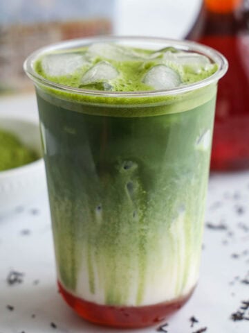 Cup of Earl Grey Matcha with Earl Grey Syrup, milk, matcha, and ice.